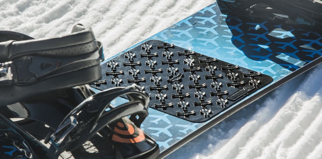 Snowboard stomp pads